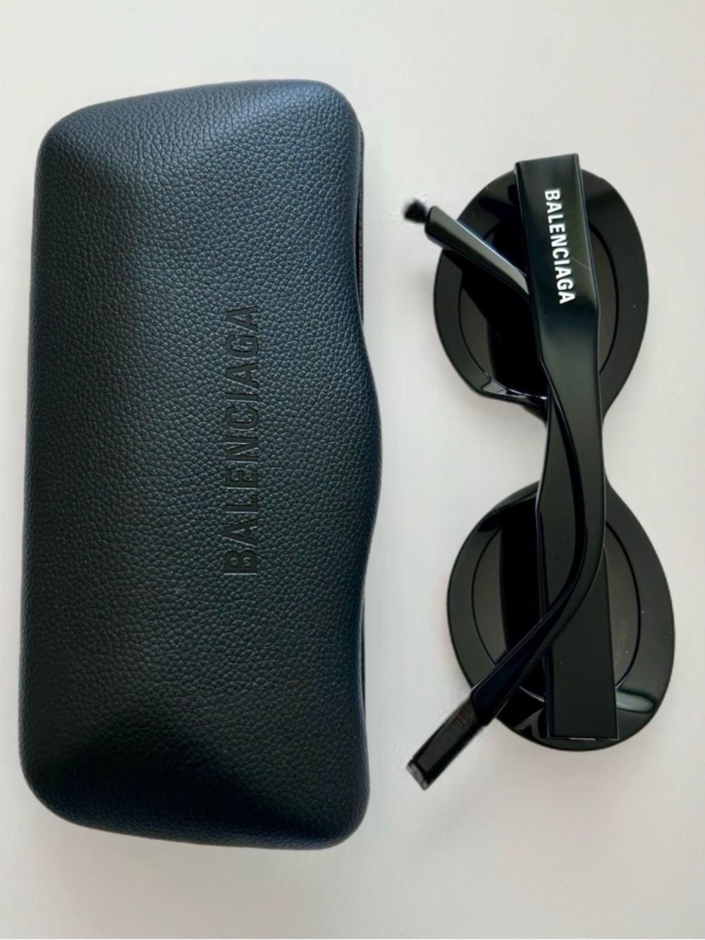 Balenciaga Glossy Black Round Sunglasses with Logo Temples.  
$400+ retail